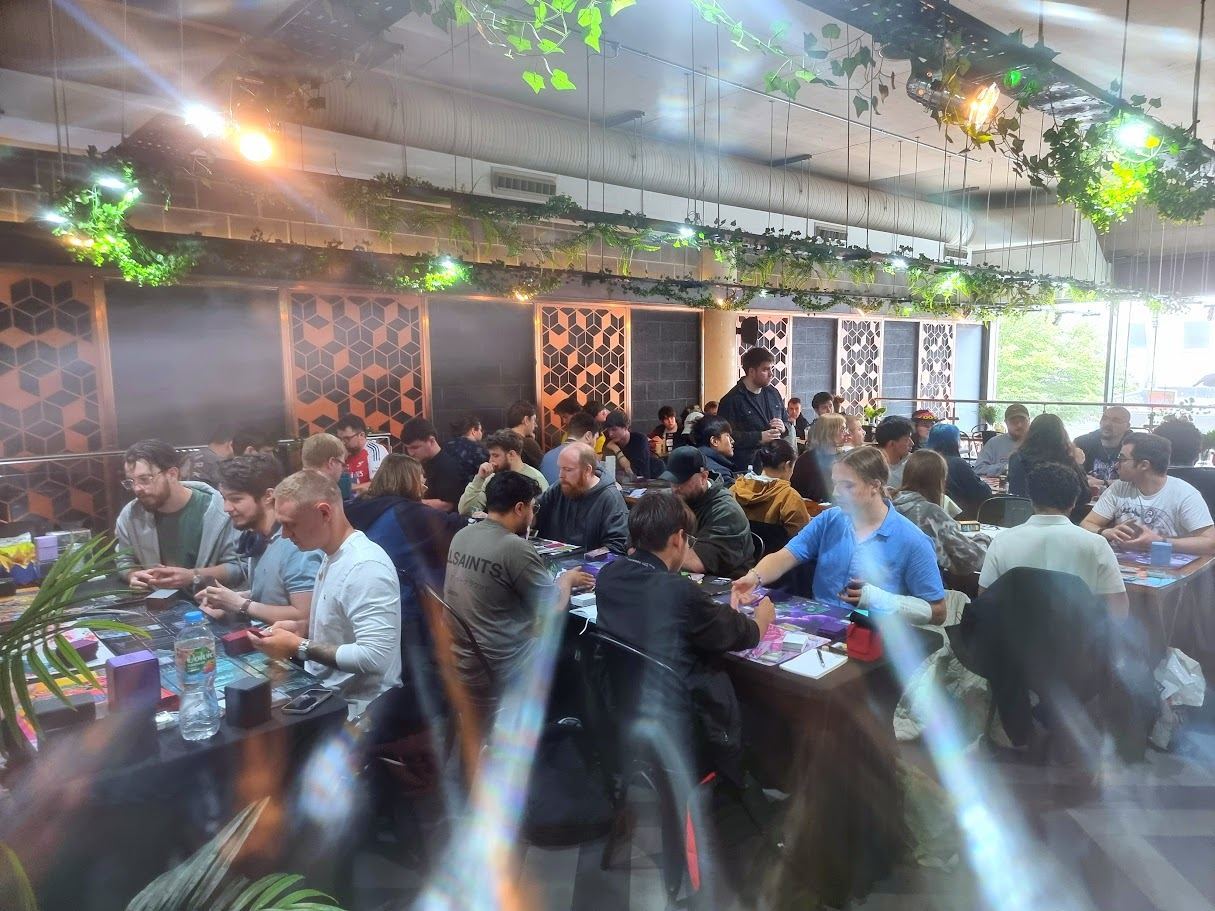 Players at a Magic event in the Dice & Dumplings games room