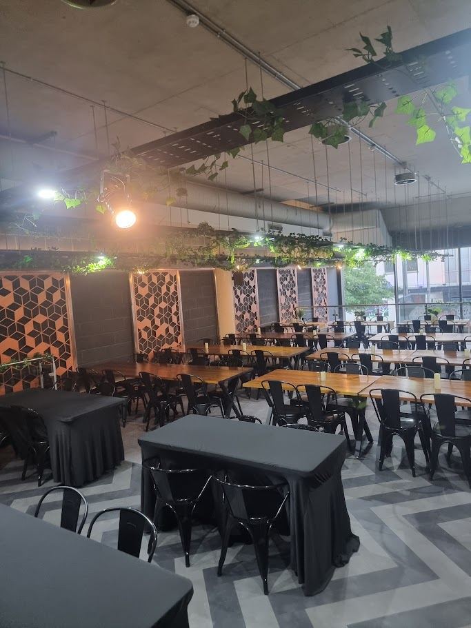 The play space with rows of tables
